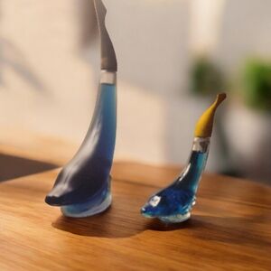 Elegant Blue Dolphin Glass Figurine Set